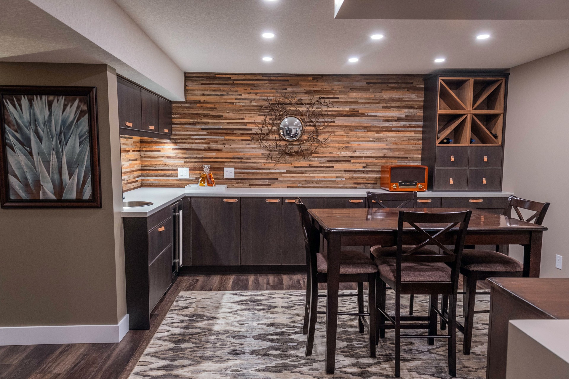 Renovated rustic basement featuring bar, wine rack and reclaimed wood